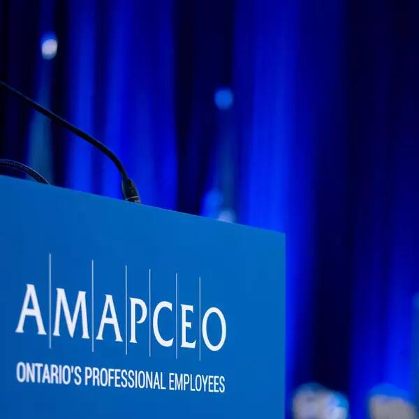 Image of AMAPCEO signage on a podium (to represent Board of Directors changes)